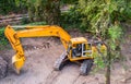 Heavy modern yellow digger excavator Royalty Free Stock Photo