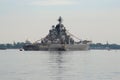 The heavy nuclear-powered cruiser `Peter the Great` on the Kronstadt raid on a cloudy July day