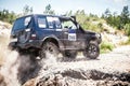 Heavy off road racing car drive along the dusty road Royalty Free Stock Photo