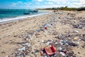 heavy plastic pollution on the beach of tropical sea