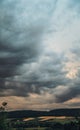 Heavy rain clouds in the deep blue sky before the rain at the summer day Royalty Free Stock Photo