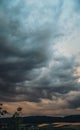 Heavy rain clouds in the deep blue sky before the rain at the summer day Royalty Free Stock Photo