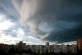 Heavy rain clouds over the city. Stormy sky over the buildings. Typical modern residential district. Kiev, Ukraine. Royalty Free Stock Photo