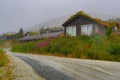 Heavy rain over Norwegian grass roof houses Myrkdalen Royalty Free Stock Photo