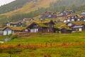 Heavy rain over Norwegian grass roof houses Myrkdalen Royalty Free Stock Photo