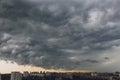 Before heavy rain storm. On the sky is covered all over by the clouds. A lot of lightning and strong wind. Royalty Free Stock Photo