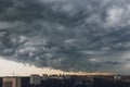 Before heavy rain storm. On the sky is covered all over by the clouds. A lot of lightning and strong wind. Royalty Free Stock Photo