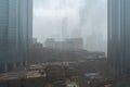 Heavy rain and thunder storm in the city | Abu Dhabi city skyline and downtown | World Trade Center and The Mall Royalty Free Stock Photo