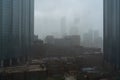 Heavy rain and thunder storm in the city | Abu Dhabi city skyline and downtown | World Trade Center and The Mall Royalty Free Stock Photo
