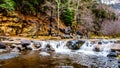 After heavy rainfall, water from Oak Creek flooding the road crossing Oak Creek at Orchard Canyon between Sedona and Flagstaff Royalty Free Stock Photo