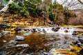 After heavy rainfall, water from Oak Creek flooding the road crossing Oak Creek at Orchard Canyon between Sedona and Flagstaff Royalty Free Stock Photo