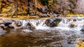 After heavy rainfall, water from Oak Creek flooding the road crossing Oak Creek at Orchard Canyon between Sedona and Flagstaff Royalty Free Stock Photo