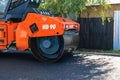 Heavy road roller on the roadway. Construction of a new road with support from the European Union structural funds. Targoviste,