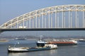 Heavy shipping traffic on river Waal and Waalbrug