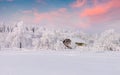 heavy snowfall covered the trees and houses in the mountain village Royalty Free Stock Photo