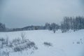 14.12.2021. Heavy snowfall in Moscow. Snowcat ratrak rides up the hill and preparation ski slope