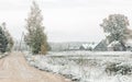 Heavy snowfall in Northern Europe countryside. White snow blizzard in rural landscape