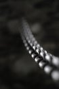 Heavy Steel or Iron Chain Fastened Into Rock Wall Royalty Free Stock Photo