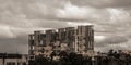 Heavy Stormy rain clouds up above highrise. Early Monsoon Rainy day city. Storms and dark monsoons typical modern residential Royalty Free Stock Photo