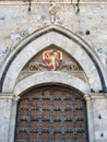 Heavy Studded Wooden Doors on Historic Siena Building, Italy Royalty Free Stock Photo