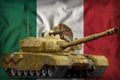 Heavy tank with desert camouflage on the Mexico national flag background. 3d Illustration Royalty Free Stock Photo