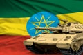 Ethiopia modern tank with not real design on the flag background - tank army forces concept military 3D Illustration