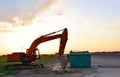 Heavy tracked excavator at a construction site