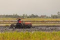 Heavy tractor during cultivation agriculture works Royalty Free Stock Photo