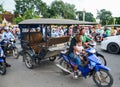 Heavy traffic through the city streets in the evening, Phnom Penh, Cambodia. August 30, 2015