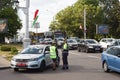 Heavy traffic jam in the city center during the rush hour with a police car patrol Royalty Free Stock Photo