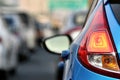 Heavy traffic jams on downtown city highway road, Car tail light close up.