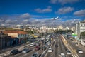 Heavy traffic of Washington Luiz Avenue, with plane landing at Congonhas airport