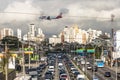 Heavy traffic of Washington Luiz Avenue, with plane landing at Congonhas airport