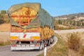 Heavy truck with load of hay on a rural tuscany Royalty Free Stock Photo