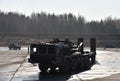 Heavy truck MZKT-741501-019 and MZKT-720100-010 semi-trailer with a carrying capacity of 52 tons for transporting military