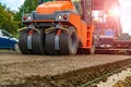 Heavy Vibration roller compactor at asphalt pavement works for road and highway construction Royalty Free Stock Photo