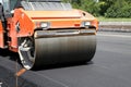 Heavy Vibration roller compactor at asphalt pavement