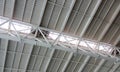 Heavy weight structural steel roof or double height ceiling of an Airport Building interior at chennai international airport with