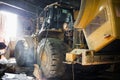 Heavy wheel loader being repaired Royalty Free Stock Photo