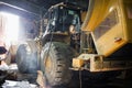 Heavy wheel loader being repaired