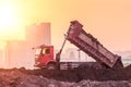 Heavy wheel loader machine working at sunset Royalty Free Stock Photo