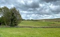 Heavy winds, and dark clouds, over the fields near the village of, Oxenhope, Keighley, UK