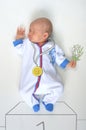 Heavyweight champion baby in sports costume Royalty Free Stock Photo