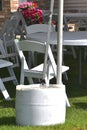 Heay concrete weight anchored to an outdoor picnic tent