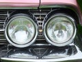 Vintage 1950s Pink Cadillac headlights and chrome Royalty Free Stock Photo