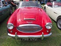 Front view of a vintage red Austin-Healey 3000 mark 2 1960s british sports car Royalty Free Stock Photo