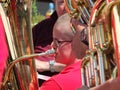 a close up of a musician from a brass band performing at the public brass march contest in hebden bridge town center