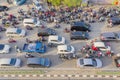 Hectic traffic with crowded cars and motorcycles