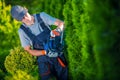 Hedge Trimmer Works Royalty Free Stock Photo