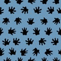 Hedgehog big foot prints. seamless repeat vector black on blue Royalty Free Stock Photo